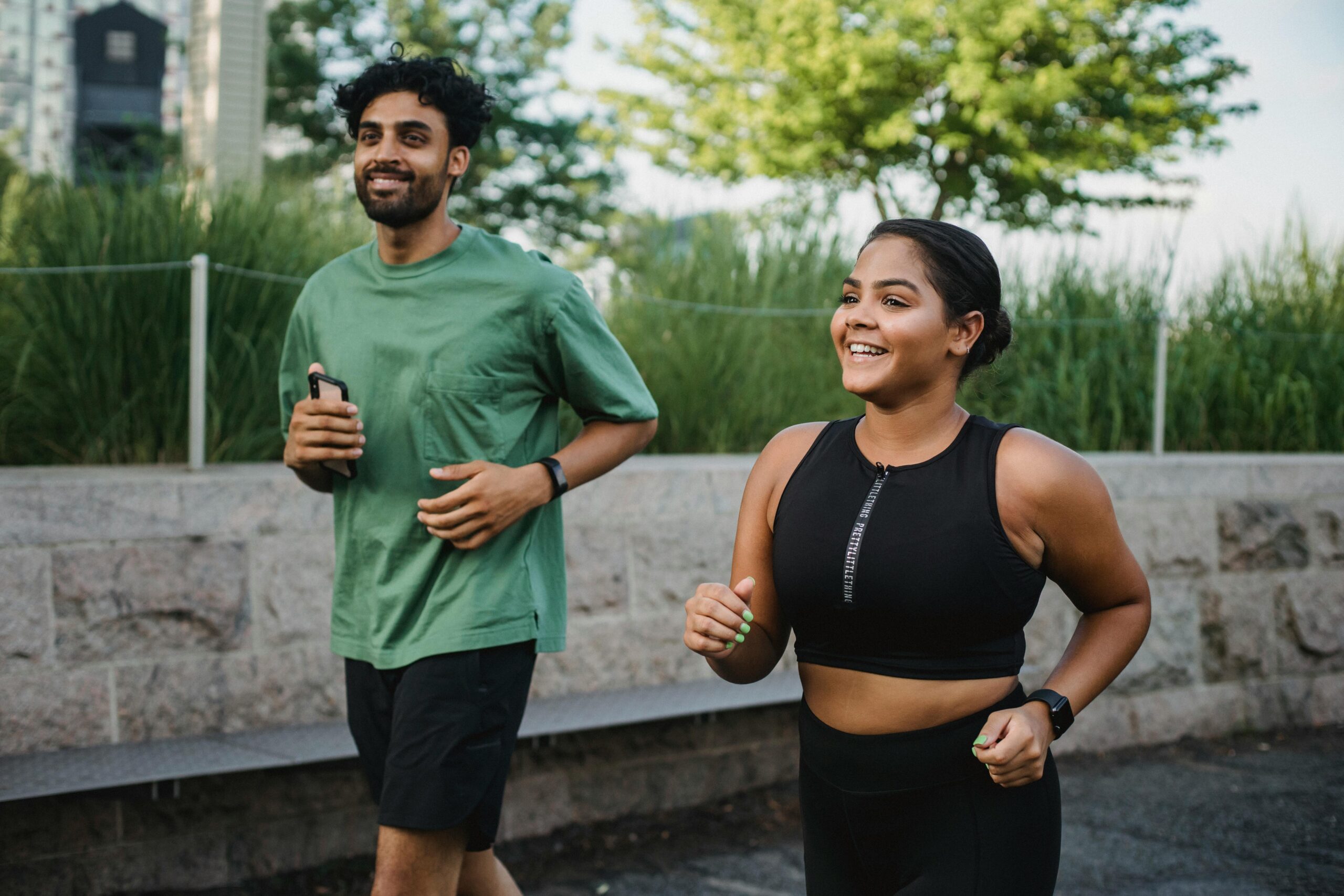 A man and a women are jogging
