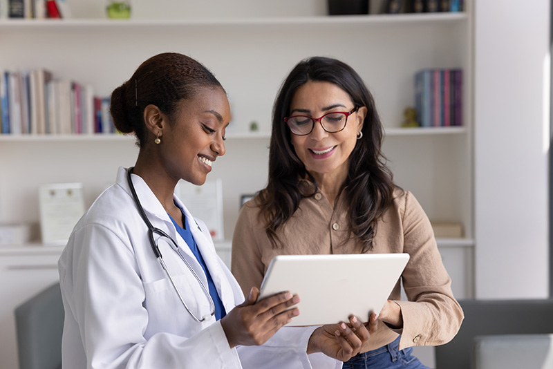 Doctor patient smiling clinical trial